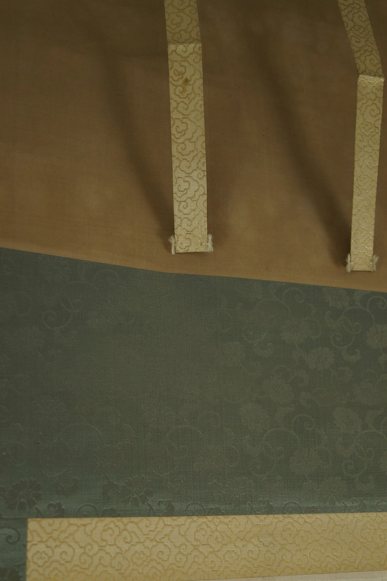 Mounting Brocade Fabric with Tying Ribbons Close-Up