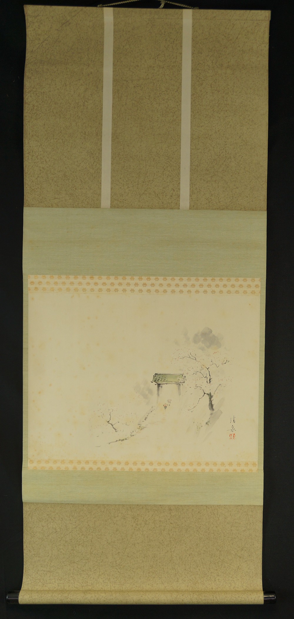 Full view of the hanging kakemono with torii and blossoming trees