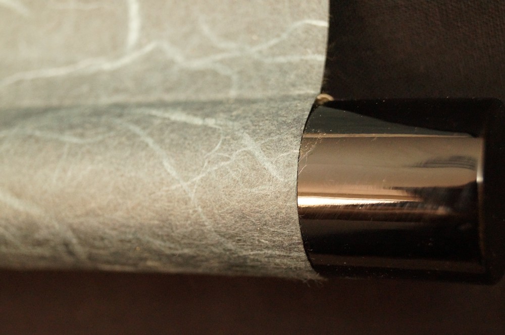 Kalligraphie Mond ueber der Bucht Rollendetail