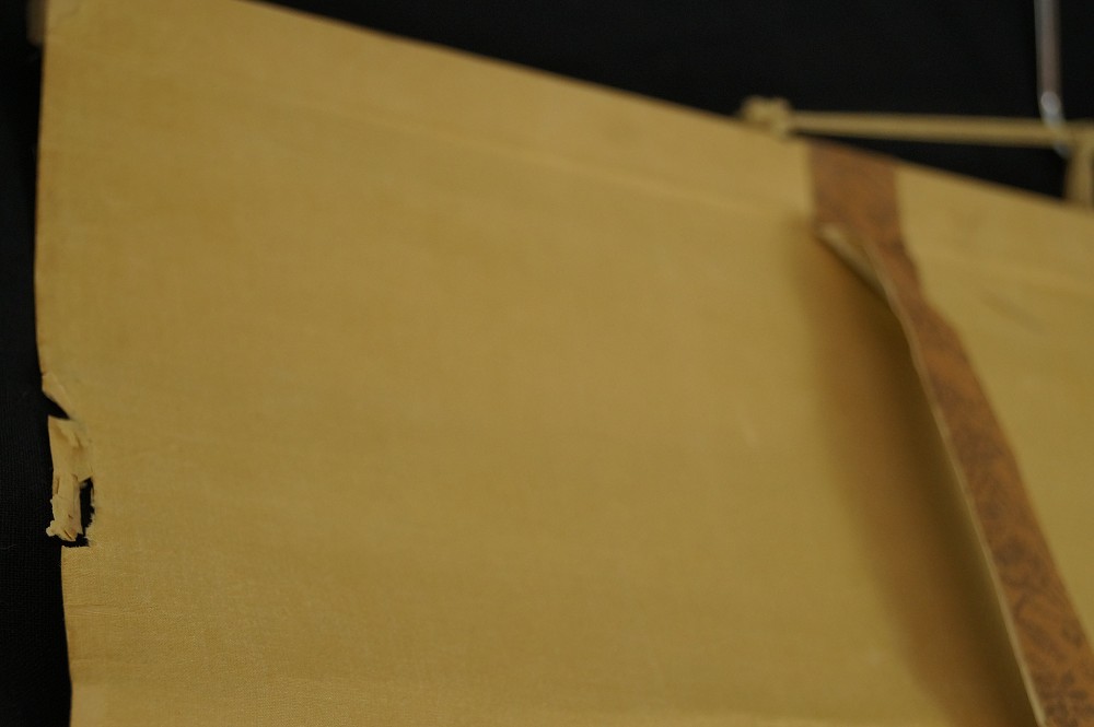Mounting Silk Fabric Close-Up with Small Flaw