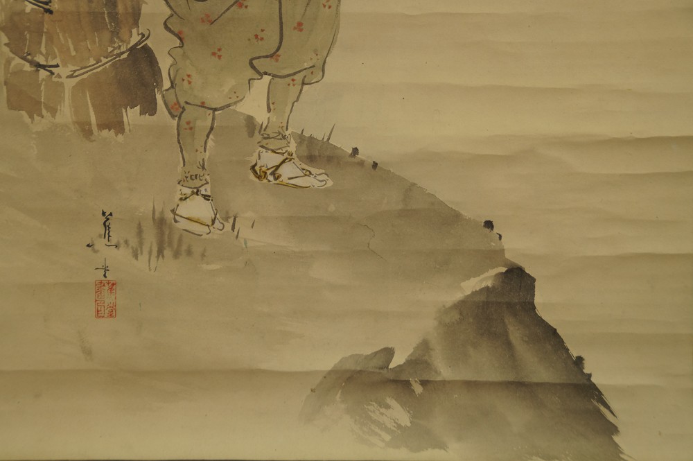 Homme devant une cascade par Shodo gros plan de la signature et du sceau