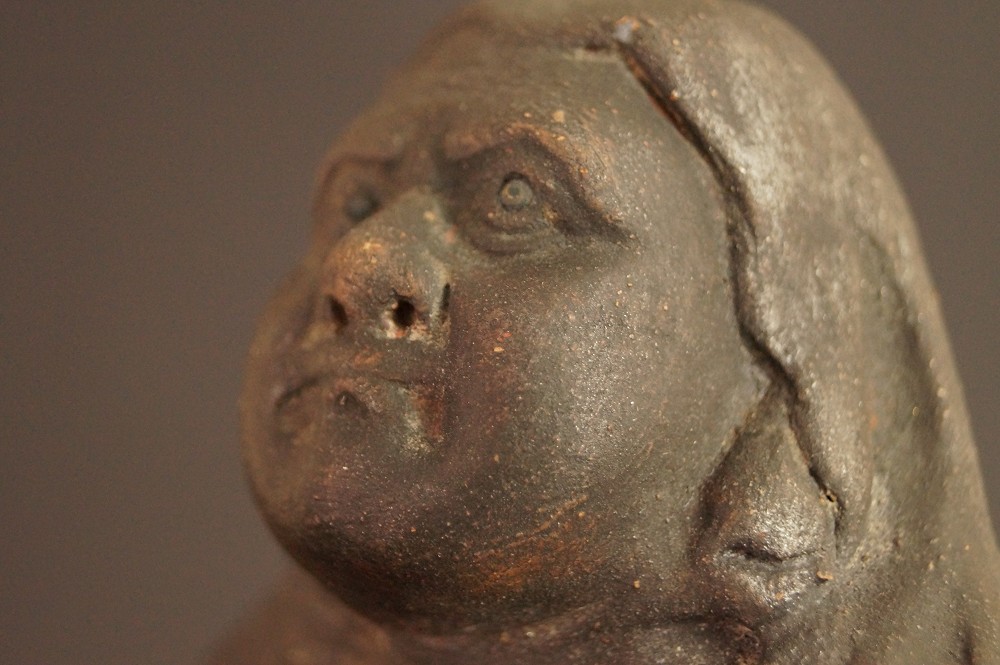 Bodhidharma Daruma Figur Gesicht-Motiv Nahaufnahme