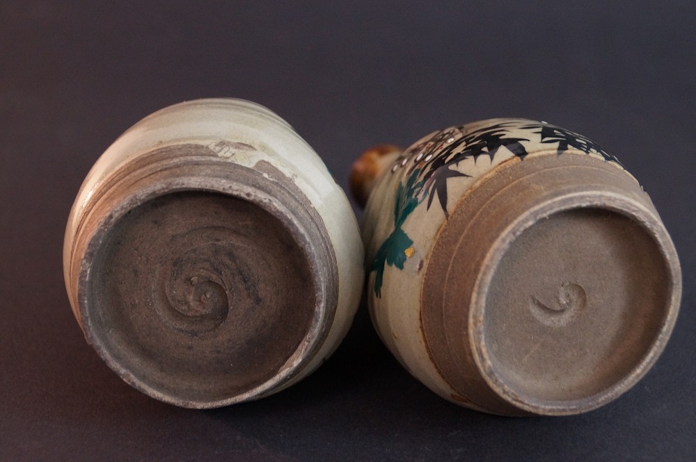 Close-up of the two footrings with stamped spiral-shaped potter's mark