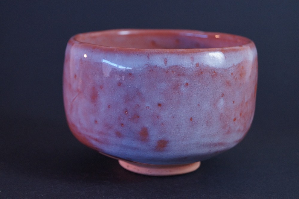 Front view of the handcrafted Raku tea bowl
