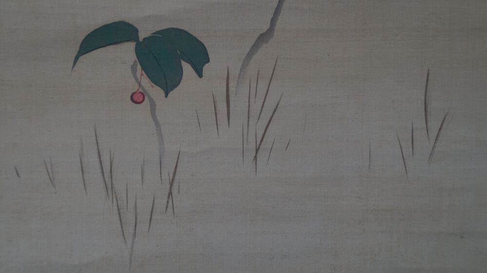 Further close-up of the leaves with a red berry in the hanging scroll Rising Sun