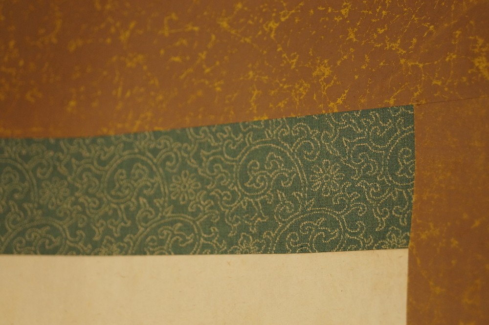 Kakemono calligrafia dettaglio del montaggio
