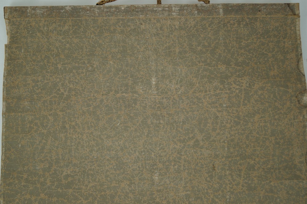 Hundewelpen im Gras Kakemono Montierungsdetail