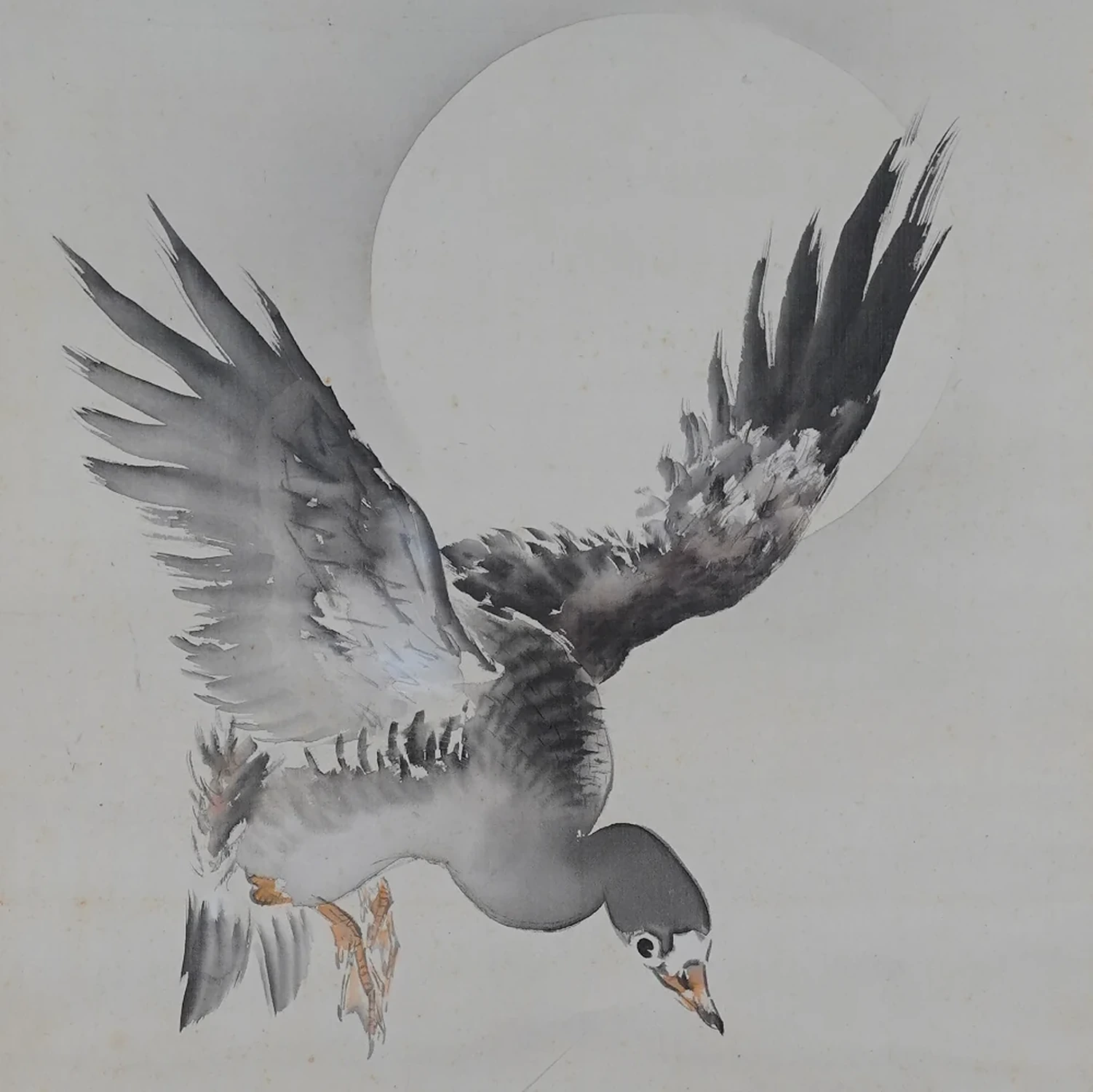 Wildgans mit ausgebreiteten Schwingen vor dem Vollmond