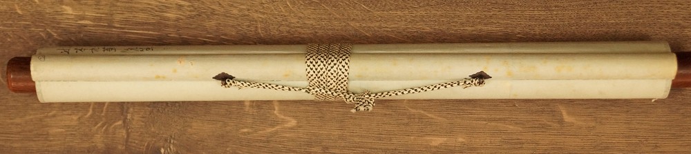 Kalligraphie Suche nach der Pflaumenbluete zusammengerollt