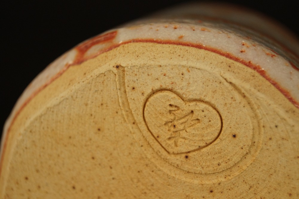 Incised heart-shaped potter's mark on the base Potter's Mark Close-Up