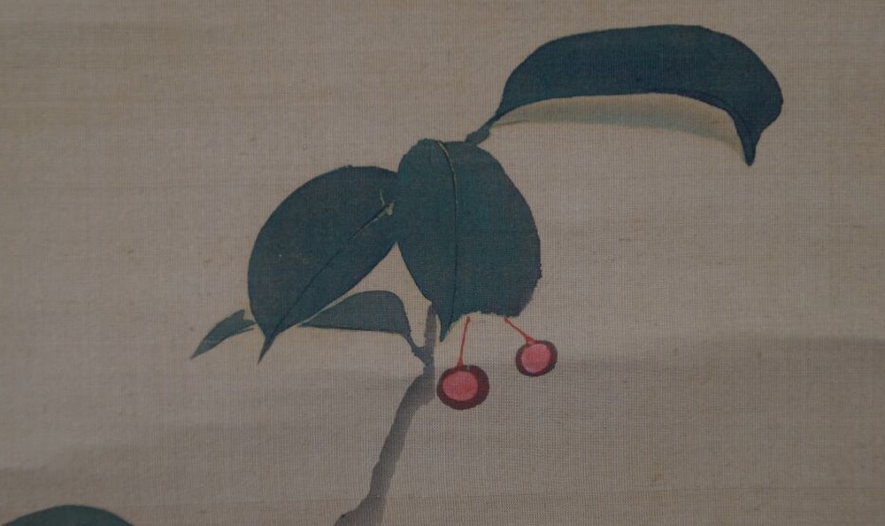 Kakemono by Hara Zaichū: dark green foliage with two red berries on silk.