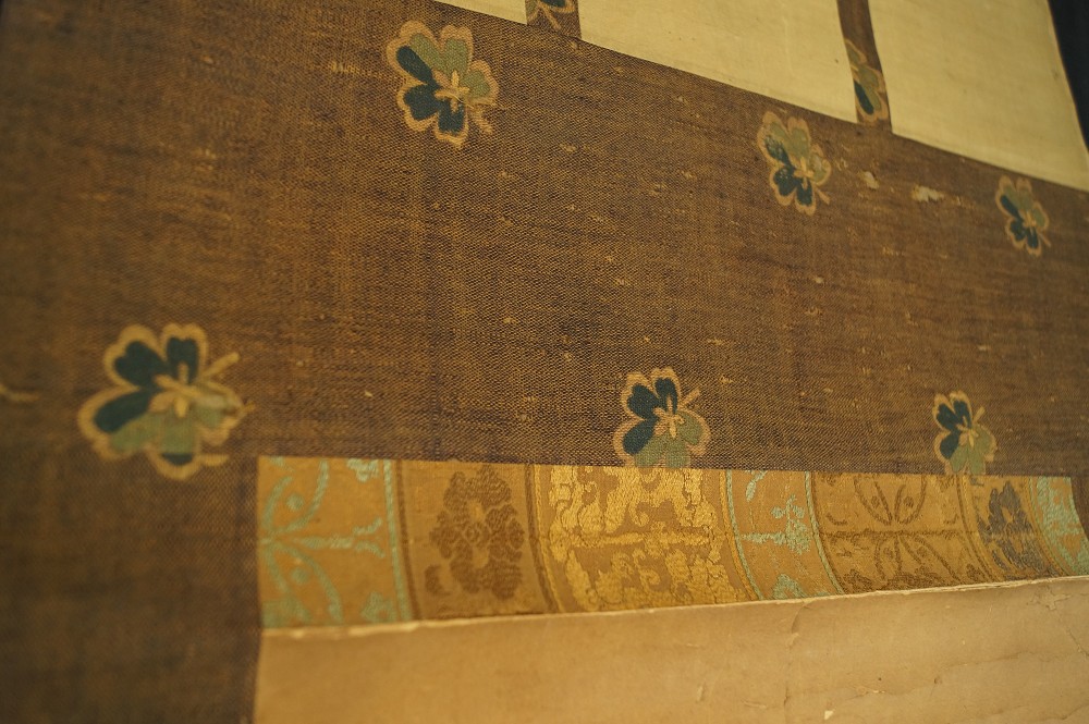Mounting Floral Patterned Fabric Close-Up